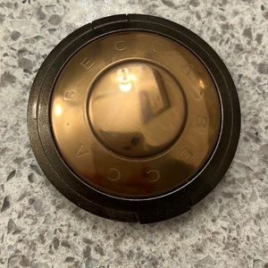 Becca highlighter in capri coast